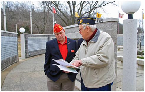 This is a picture of tour guide at the Veterans Wall of Honor in Bella Vista, AR.
